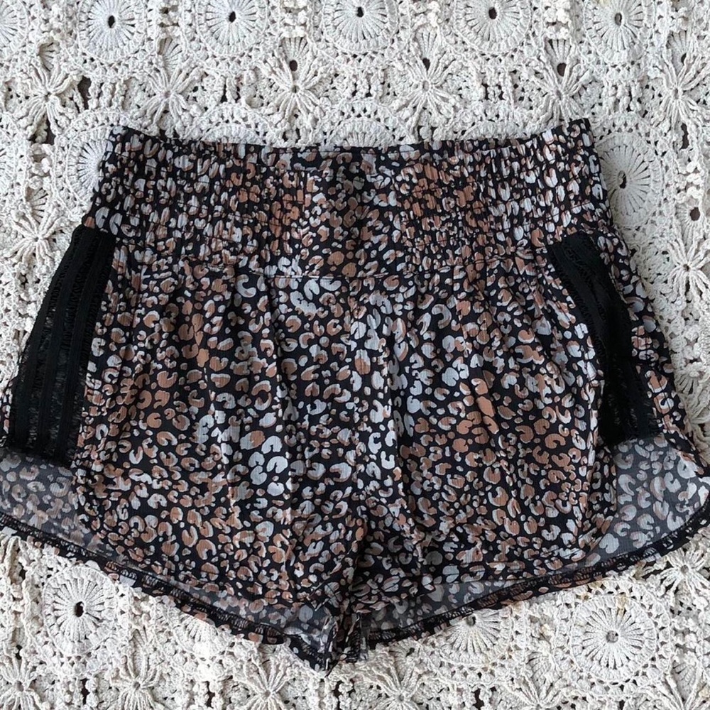 free people cheetah print with black lace design